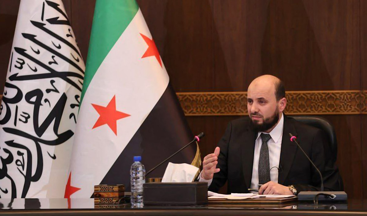 رئيس الحكومة الانتقالية في سوريا محمد البشير (أ ف ب)