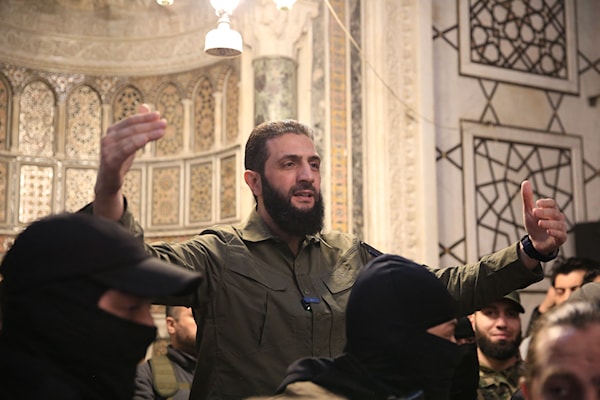 الجولاني يواصل إرسال رسائل الطمأنة حول مستقبل سوريا (ا ف ب)