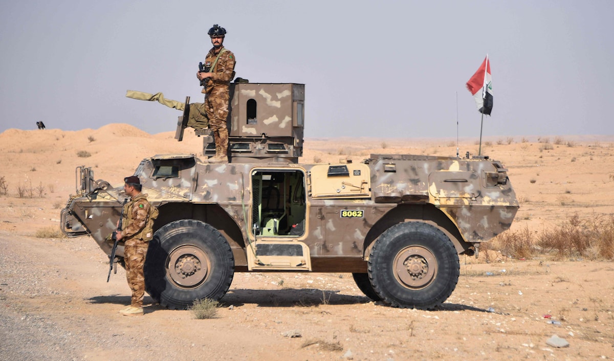 الفياض: سوريا تمثل مجالنا الأمني الحيوي الذي لا يمكن فصله عن العراق (أ ف ب)