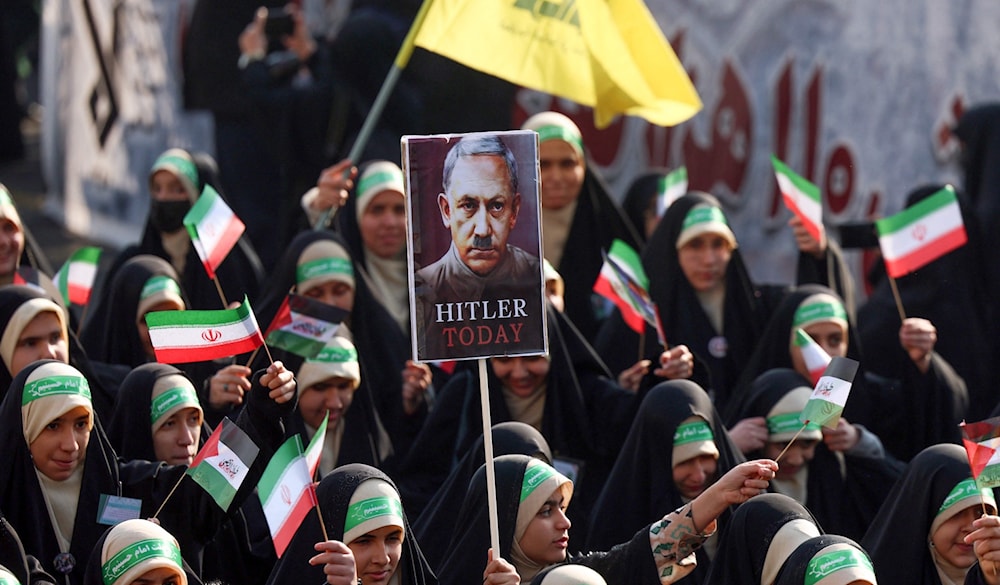 مسيرة في طهران تحت عنوان «السائرون إلى القدس»  (أ ف ب)