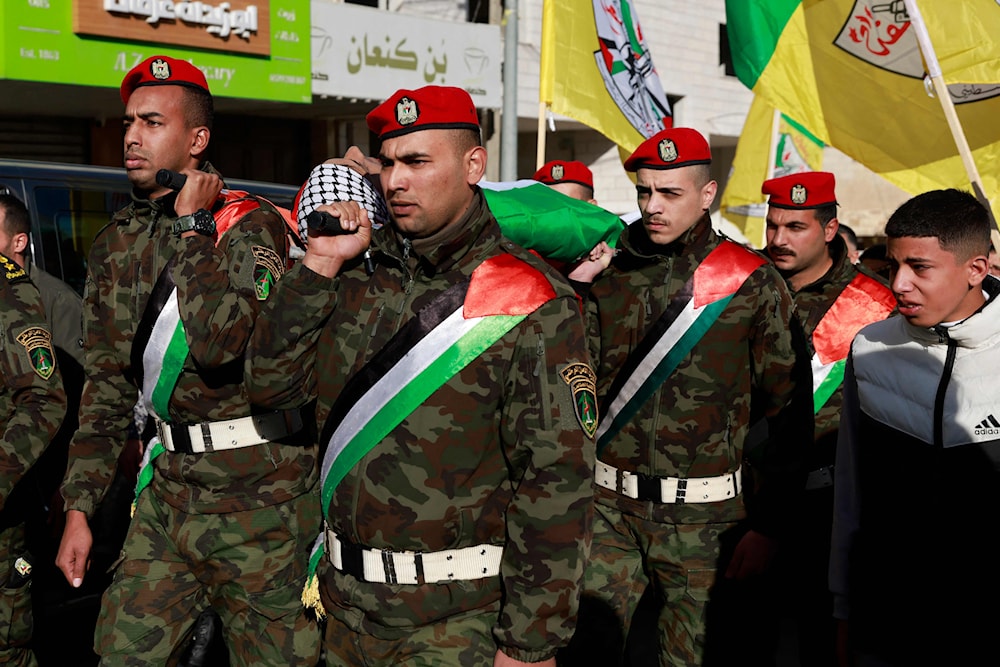 من تشييع أحد عناصر جهاز أمن السلطة الفلسطينية في نابلس يوم 23 كانون الأول 2024 (أ ف ب)
