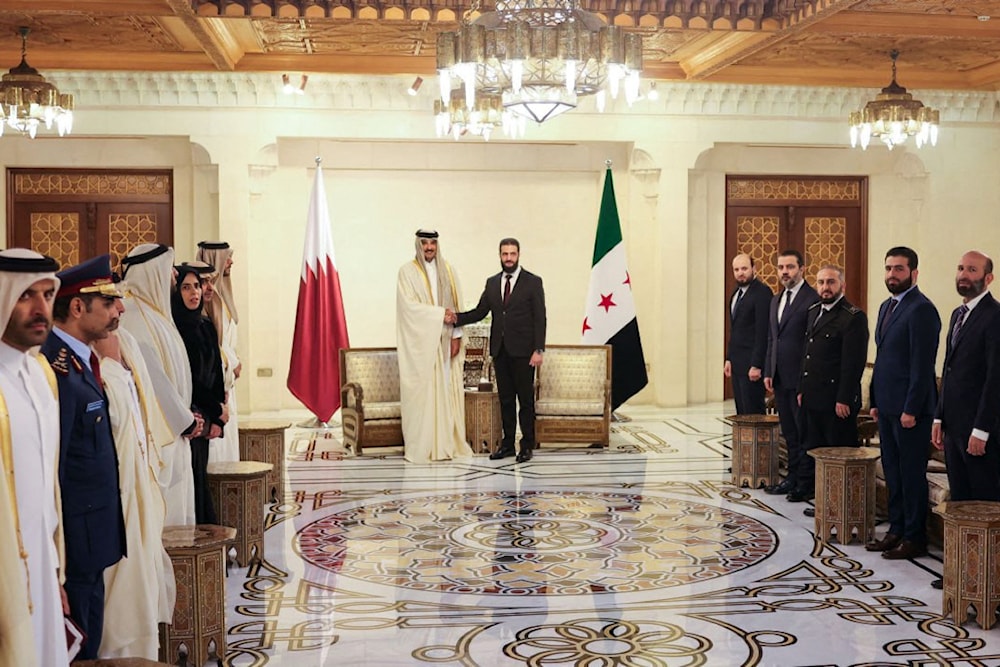 الوفد القطري في قصر الشعب في دمشق اليوم (أ ف ب)