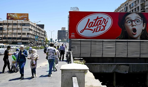 تباينت طريقة تنفيذ الجهات العامة للتوجيهات المتعلّقة بإعادة العاملين إلى وظائفهم (أ ف ب)