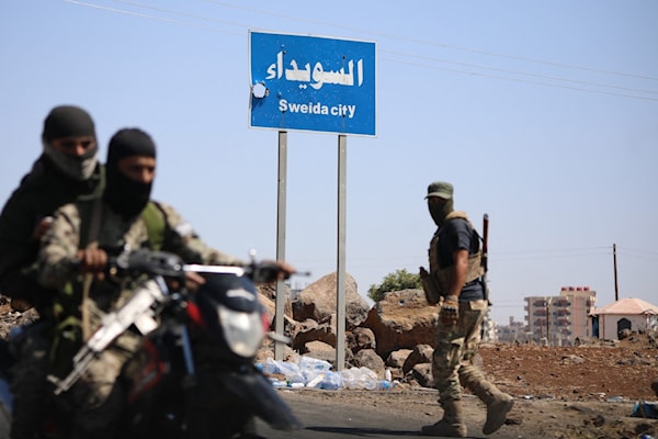 اشتباكات على الجبهة الغربية للسويداء (أ ف ب)