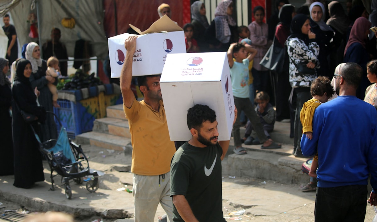 يُشغّل برنامج الأغذية العالمي حالياً 44 مركز توزيع في القطاع (أ ف ب)