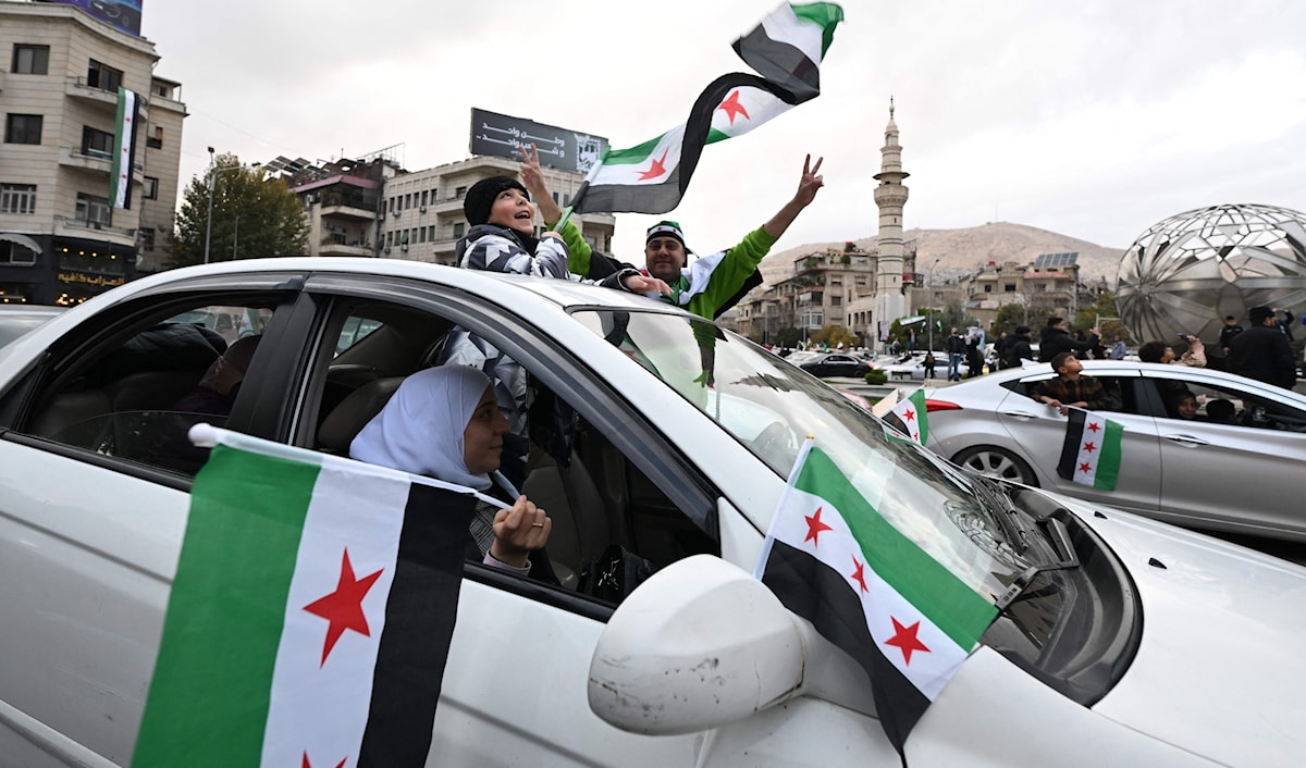 دعت الخارجية السورية جميع السوريين في الداخل والمهجر إلى الإسهام في جهود النهوض الوطني. (أ ف ب)