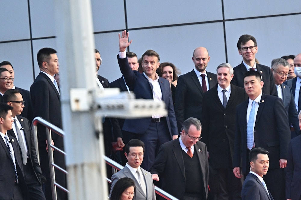 ماكرون في الصين (أ ف ب)