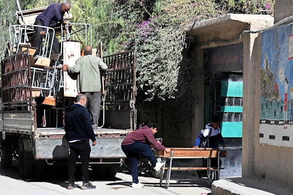 شدّدت المؤسسات التعليمية والدوائر الحكومية في الساحل السوري إجراءاتها لمواجهة الإضراب. (أ ف ب)