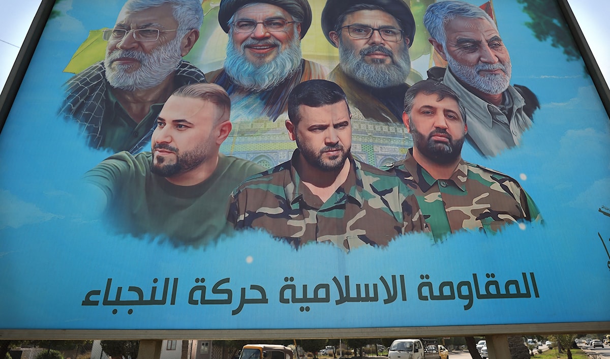 تشكيك واسع في العراق بنوايا الرئيس السوري للمرحلة الانتقالية، أحمد الشرع (أ ف ب)