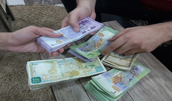 رواتب العاملين السوريين عبر تطبيق «شام كاش»