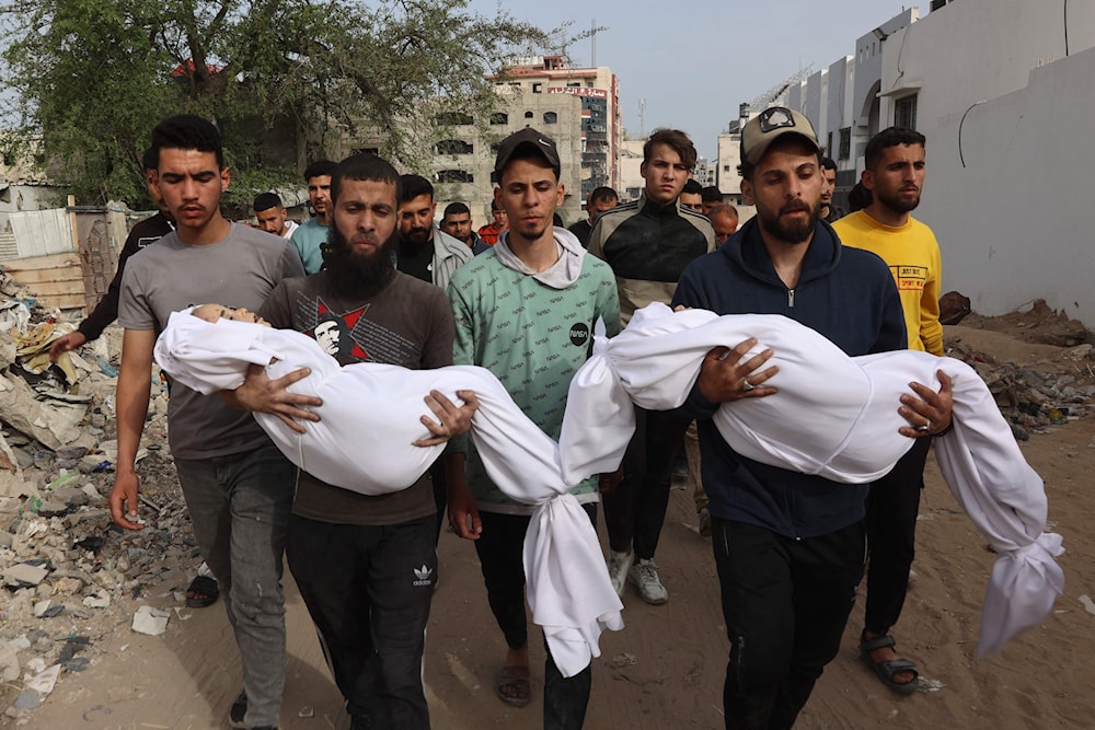 50 شهيداً و152 جريحاً وصلوا مستشفيات غزة (أ ف ب)