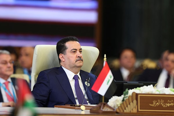 قوى في «التنسيقي» انتقدت انخفاض مستوى التمثيل في قمة بغداد (أ ف ب)