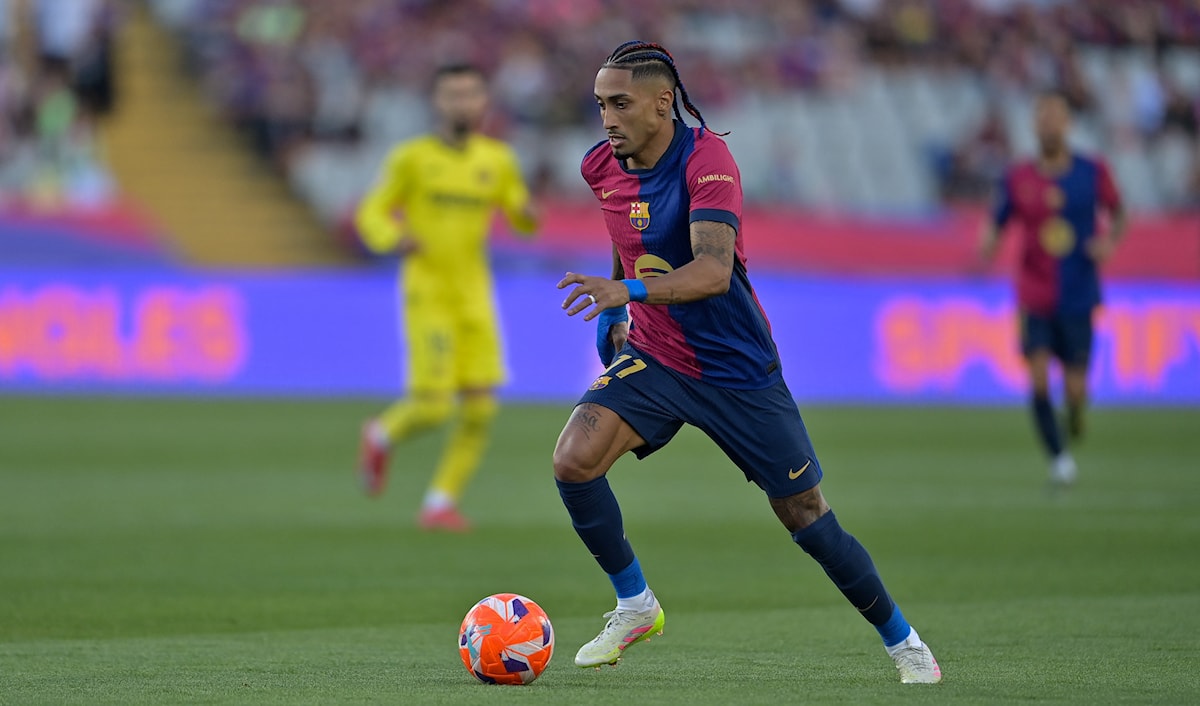 لعب رافينيا دوراً مؤثّراً جداً هذا الموسم بإحراز برشلونة الثلاثية المحلية (أ ف ب)