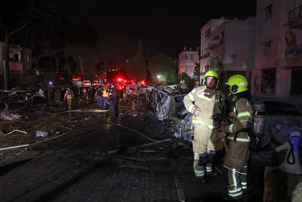 الدمار في حيفا المحتلة نتيجة الصواريخ الإيرانية (أ ف ب)
