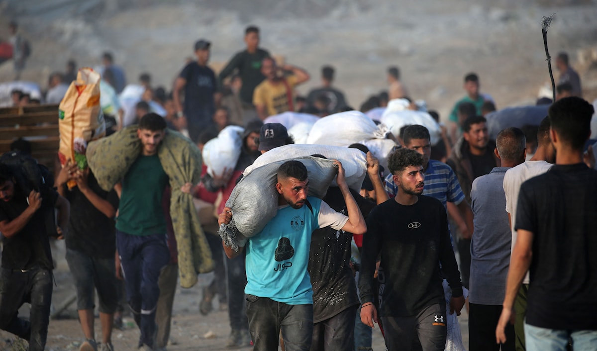 ما يحدث في مراكز المساعدات في غزة هو جريمة حرب مكتملة الأركان (أ ف ب)