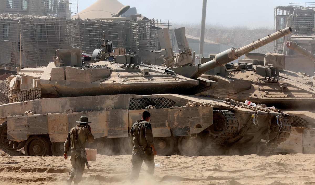 استشهد 29 فلسطينياً وأصيب العشرات في مجزرة بغزة (أ ف ب)