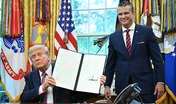 استدعى قرار ترامب انتقادات واسعة من الديموقراطيين (أ ف ب)