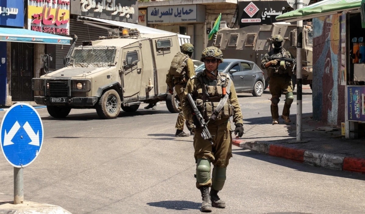 بلغت حالات الاعتقال خلال عام 2025 أكثر من 7000 بالضّفة بما فيها القدس (أ ف ب)