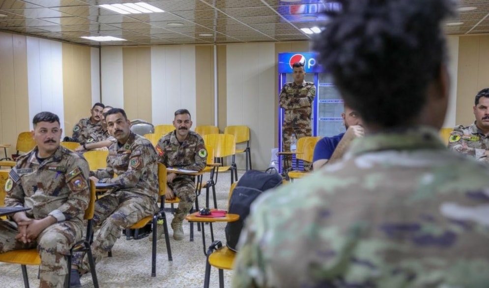 عناصر من قوات التحالف والقوات الخاصة العراقية خلال نشاط مشترك قرب بغداد العام الفائت (من الويب)