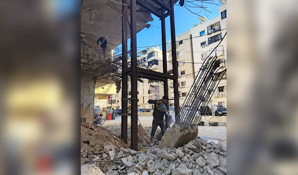 أعمال ترميم إنشائية في أحد المباني في الضاحية الجنوبية (الأخبار)