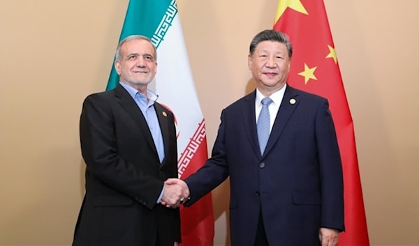 بكين أكثر وضوحاً في دعم طهران ضد العدوان (أ ف ب)