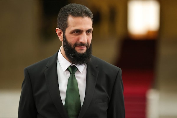 ضمّت قائمة الأعضاء الذين عيّنهم الشرع 15 امرأة (أ ف ب)