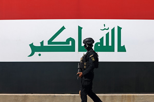 العراق يحتفل بيوم «السيادة» مع انسحاب «التحالف» (أ ف ب)
